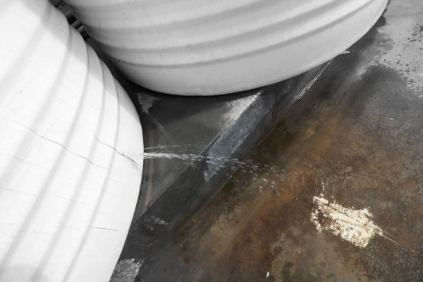 Fresh water leaking from water storage tank during summer season at home.